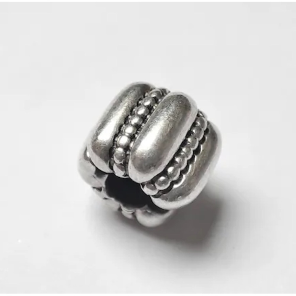 Authentic Pandora Dots & Ridges Barrel
Sterling Silver Clip Charm 791011